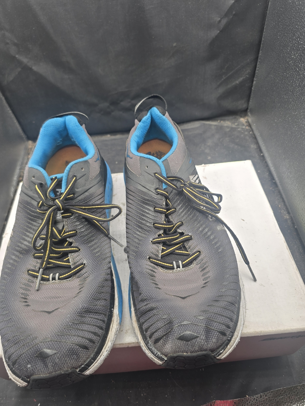 Hoka One One Men's Athletic Shoes - Black with Blue Lining and Yellow Accents